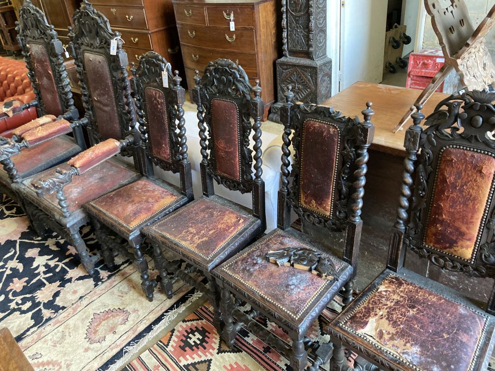 A set of six 19th century Flemish carved oak dining chairs,
